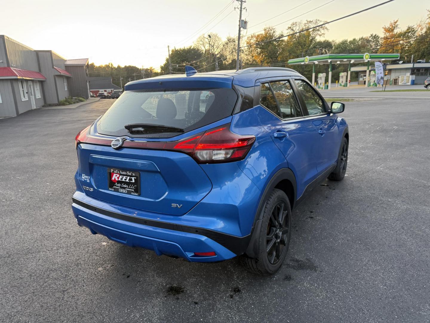 2021 Blue /Black Nissan Kicks SV (3N1CP5CV8ML) with an 1.6L I4 engine, Automatic transmission, located at 11115 Chardon Rd. , Chardon, OH, 44024, (440) 214-9705, 41.580246, -81.241943 - This One Owner 2021 Nissan Kicks SV is powered by a fuel-efficient 1.6L I4 engine delivering up to 36 MPG on the highway, and comes well-equipped with an 8.0" touchscreen featuring Apple CarPlay and Android Auto, adaptive cruise control, lane departure warning, and blind spot monitoring. Additional - Photo#7