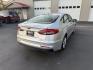 2019 Silver /Black Ford Fusion Hybrid SE (3FA6P0LU3KR) with an 2.0L I4 DOHC 16V HYBRID engine, Automatic transmission, located at 547 E. Main St., Orwell, OH, 44076, (440) 437-5893, 41.535435, -80.847855 - This 2019 Ford Fusion SE Hybrid SE is a well-appointed midsize sedan that skillfully blends fuel efficiency, comfort, and the latest driver-assist technology. Powered by a 2.0-liter inline-four hybrid engine, it delivers an impressive 42 MPG combined, making it a smart choice for those seeking to sa - Photo#7