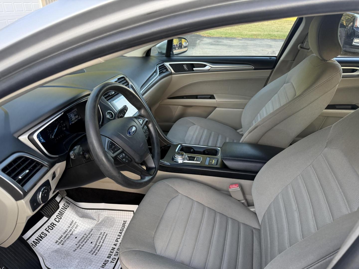 2019 Silver /Black Ford Fusion Hybrid SE (3FA6P0LU3KR) with an 2.0L I4 DOHC 16V HYBRID engine, Automatic transmission, located at 547 E. Main St., Orwell, OH, 44076, (440) 437-5893, 41.535435, -80.847855 - This 2019 Ford Fusion SE Hybrid SE is a well-appointed midsize sedan that skillfully blends fuel efficiency, comfort, and the latest driver-assist technology. Powered by a 2.0-liter inline-four hybrid engine, it delivers an impressive 42 MPG combined, making it a smart choice for those seeking to sa - Photo#16