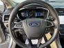 2019 Silver /Black Ford Fusion Hybrid SE (3FA6P0LU3KR) with an 2.0L I4 DOHC 16V HYBRID engine, Automatic transmission, located at 547 E. Main St., Orwell, OH, 44076, (440) 437-5893, 41.535435, -80.847855 - This 2019 Ford Fusion SE Hybrid SE is a well-appointed midsize sedan that skillfully blends fuel efficiency, comfort, and the latest driver-assist technology. Powered by a 2.0-liter inline-four hybrid engine, it delivers an impressive 42 MPG combined, making it a smart choice for those seeking to sa - Photo#25