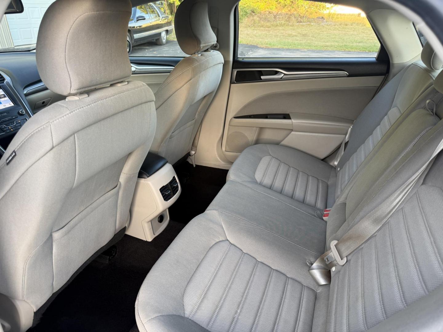 2019 Silver /Black Ford Fusion Hybrid SE (3FA6P0LU3KR) with an 2.0L I4 DOHC 16V HYBRID engine, Automatic transmission, located at 547 E. Main St., Orwell, OH, 44076, (440) 437-5893, 41.535435, -80.847855 - This 2019 Ford Fusion SE Hybrid SE is a well-appointed midsize sedan that skillfully blends fuel efficiency, comfort, and the latest driver-assist technology. Powered by a 2.0-liter inline-four hybrid engine, it delivers an impressive 42 MPG combined, making it a smart choice for those seeking to sa - Photo#32