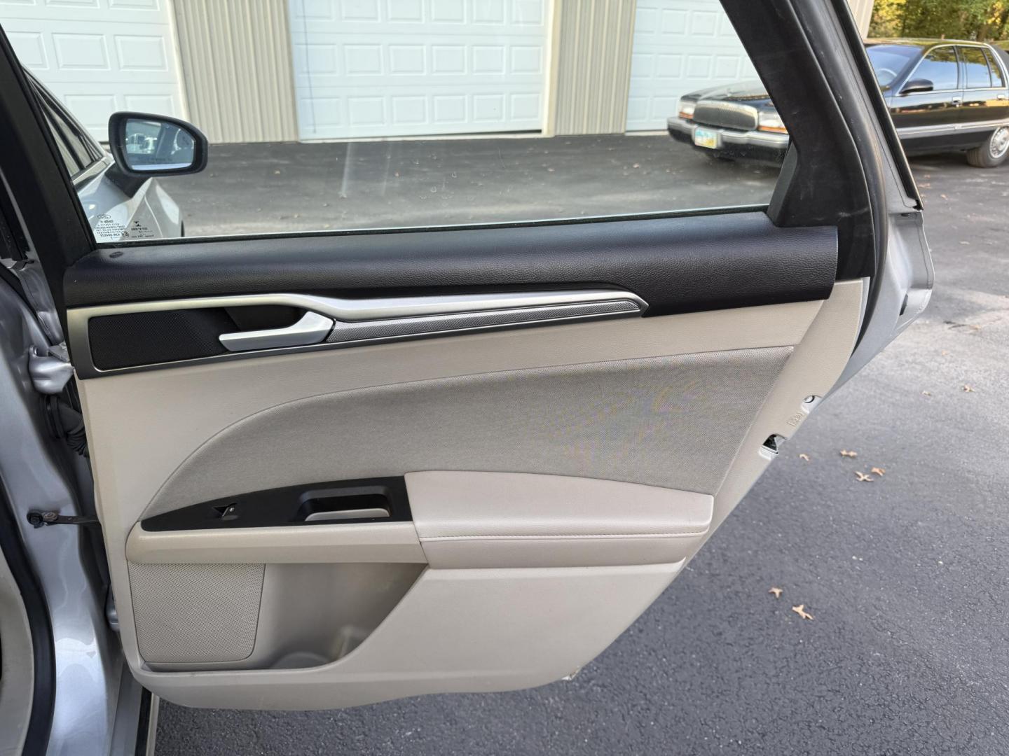 2019 Silver /Black Ford Fusion Hybrid SE (3FA6P0LU3KR) with an 2.0L I4 DOHC 16V HYBRID engine, Automatic transmission, located at 547 E. Main St., Orwell, OH, 44076, (440) 437-5893, 41.535435, -80.847855 - This 2019 Ford Fusion SE Hybrid SE is a well-appointed midsize sedan that skillfully blends fuel efficiency, comfort, and the latest driver-assist technology. Powered by a 2.0-liter inline-four hybrid engine, it delivers an impressive 42 MPG combined, making it a smart choice for those seeking to sa - Photo#39