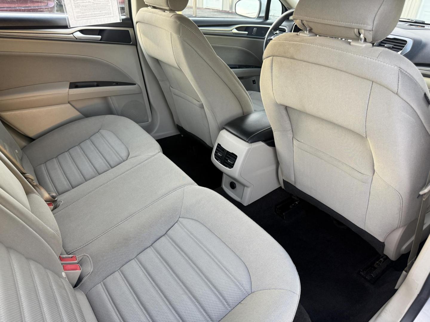 2019 Silver /Black Ford Fusion Hybrid SE (3FA6P0LU3KR) with an 2.0L I4 DOHC 16V HYBRID engine, Automatic transmission, located at 547 E. Main St., Orwell, OH, 44076, (440) 437-5893, 41.535435, -80.847855 - This 2019 Ford Fusion SE Hybrid SE is a well-appointed midsize sedan that skillfully blends fuel efficiency, comfort, and the latest driver-assist technology. Powered by a 2.0-liter inline-four hybrid engine, it delivers an impressive 42 MPG combined, making it a smart choice for those seeking to sa - Photo#38