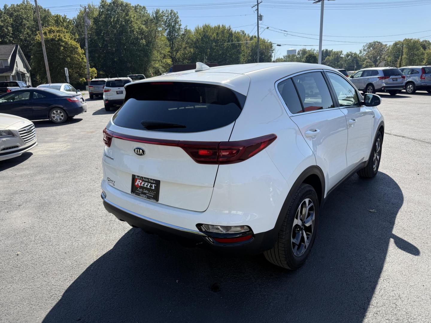 2020 White /Black Kia Sportage LX AWD (KNDPMCAC2L7) with an 2.4L I4 DOHC 24V engine, 6A transmission, located at 547 E. Main St., Orwell, OH, 44076, (440) 437-5893, 41.535435, -80.847855 - This One Owner 2020 Kia Sportage LX AWD is a versatile and well-equipped compact SUV designed to provide confidence and comfort in a wide range of driving conditions. Powered by a 2.4-liter I4 GDI engine paired with a 6-speed automatic transmission, this Sportage LX offers responsive acceleration an - Photo#7