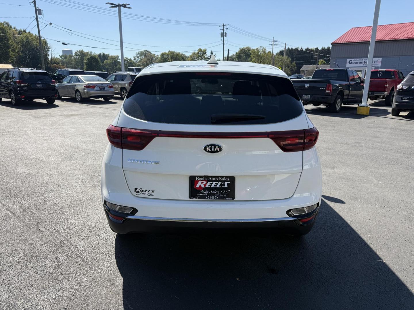 2020 White /Black Kia Sportage LX AWD (KNDPMCAC2L7) with an 2.4L I4 DOHC 24V engine, 6A transmission, located at 547 E. Main St., Orwell, OH, 44076, (440) 437-5893, 41.535435, -80.847855 - This One Owner 2020 Kia Sportage LX AWD is a versatile and well-equipped compact SUV designed to provide confidence and comfort in a wide range of driving conditions. Powered by a 2.4-liter I4 GDI engine paired with a 6-speed automatic transmission, this Sportage LX offers responsive acceleration an - Photo#8