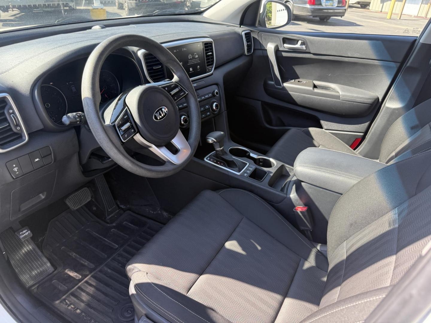 2020 White /Black Kia Sportage LX AWD (KNDPMCAC2L7) with an 2.4L I4 DOHC 24V engine, 6A transmission, located at 547 E. Main St., Orwell, OH, 44076, (440) 437-5893, 41.535435, -80.847855 - This One Owner 2020 Kia Sportage LX AWD is a versatile and well-equipped compact SUV designed to provide confidence and comfort in a wide range of driving conditions. Powered by a 2.4-liter I4 GDI engine paired with a 6-speed automatic transmission, this Sportage LX offers responsive acceleration an - Photo#15