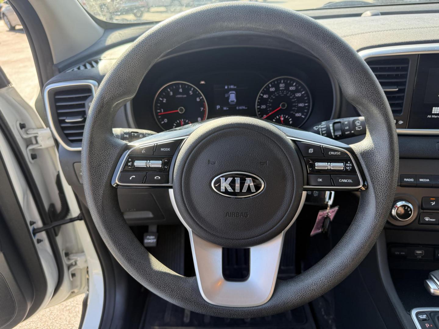 2020 White /Black Kia Sportage LX AWD (KNDPMCAC2L7) with an 2.4L I4 DOHC 24V engine, 6A transmission, located at 547 E. Main St., Orwell, OH, 44076, (440) 437-5893, 41.535435, -80.847855 - This One Owner 2020 Kia Sportage LX AWD is a versatile and well-equipped compact SUV designed to provide confidence and comfort in a wide range of driving conditions. Powered by a 2.4-liter I4 GDI engine paired with a 6-speed automatic transmission, this Sportage LX offers responsive acceleration an - Photo#21