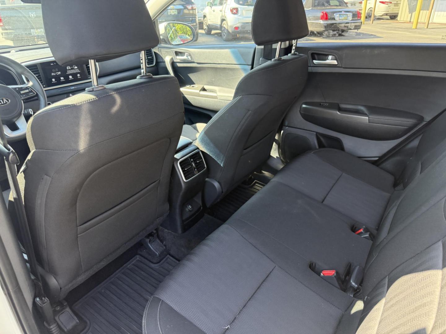 2020 White /Black Kia Sportage LX AWD (KNDPMCAC2L7) with an 2.4L I4 DOHC 24V engine, 6A transmission, located at 547 E. Main St., Orwell, OH, 44076, (440) 437-5893, 41.535435, -80.847855 - This One Owner 2020 Kia Sportage LX AWD is a versatile and well-equipped compact SUV designed to provide confidence and comfort in a wide range of driving conditions. Powered by a 2.4-liter I4 GDI engine paired with a 6-speed automatic transmission, this Sportage LX offers responsive acceleration an - Photo#26