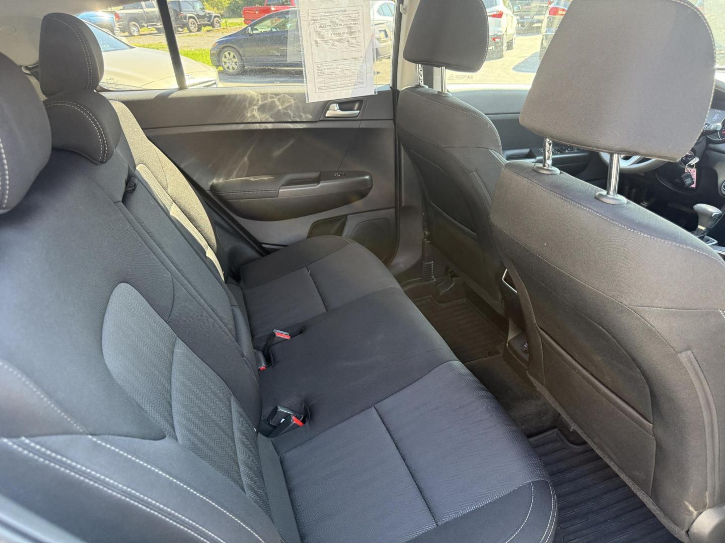 2020 White /Black Kia Sportage LX AWD (KNDPMCAC2L7) with an 2.4L I4 DOHC 24V engine, 6A transmission, located at 547 E. Main St., Orwell, OH, 44076, (440) 437-5893, 41.535435, -80.847855 - This One Owner 2020 Kia Sportage LX AWD is a versatile and well-equipped compact SUV designed to provide confidence and comfort in a wide range of driving conditions. Powered by a 2.4-liter I4 GDI engine paired with a 6-speed automatic transmission, this Sportage LX offers responsive acceleration an - Photo#32