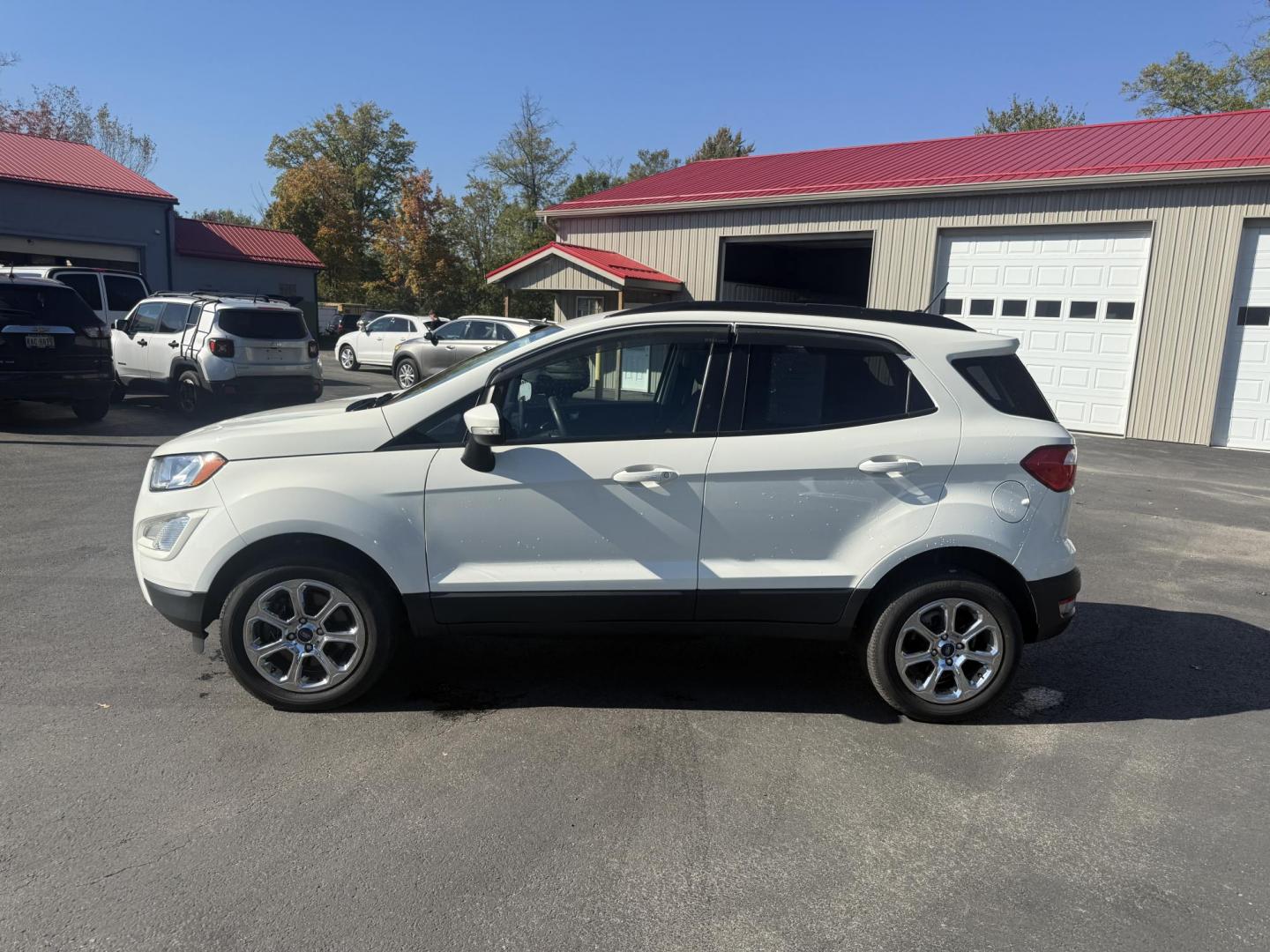 2020 White /Black Ford EcoSport SE AWD (MAJ6S3GL9LC) with an 2.0L I4 DOHC 16V engine, 6A transmission, located at 547 E. Main St., Orwell, OH, 44076, (440) 437-5893, 41.535435, -80.847855 - Discover comfort, technology, and versatility in this One Owner 2020 Ford EcoSport SE with All-Wheel Drive and a fuel-efficient 2.0L I4 Duratec engine. Enjoy smooth, responsive performance thanks to its 6-speed automatic transmission and achieve up to 29 MPG on the highway. Inside, you’ll find a w - Photo#12