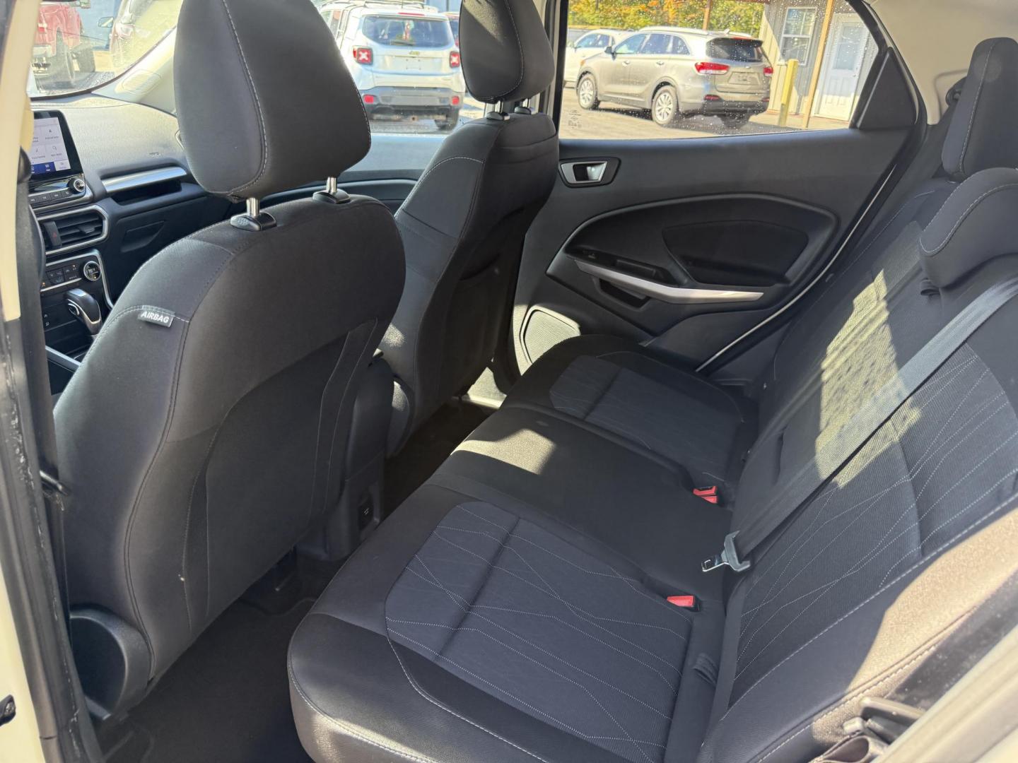 2020 White /Black Ford EcoSport SE AWD (MAJ6S3GL9LC) with an 2.0L I4 DOHC 16V engine, 6A transmission, located at 547 E. Main St., Orwell, OH, 44076, (440) 437-5893, 41.535435, -80.847855 - Discover comfort, technology, and versatility in this One Owner 2020 Ford EcoSport SE with All-Wheel Drive and a fuel-efficient 2.0L I4 Duratec engine. Enjoy smooth, responsive performance thanks to its 6-speed automatic transmission and achieve up to 29 MPG on the highway. Inside, you’ll find a w - Photo#35