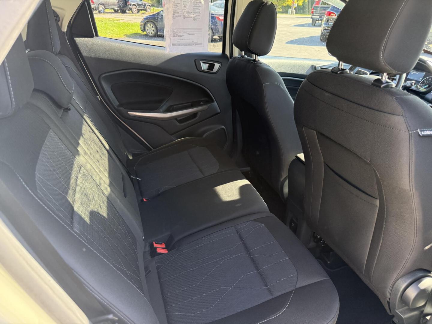 2020 White /Black Ford EcoSport SE AWD (MAJ6S3GL9LC) with an 2.0L I4 DOHC 16V engine, 6A transmission, located at 547 E. Main St., Orwell, OH, 44076, (440) 437-5893, 41.535435, -80.847855 - Discover comfort, technology, and versatility in this One Owner 2020 Ford EcoSport SE with All-Wheel Drive and a fuel-efficient 2.0L I4 Duratec engine. Enjoy smooth, responsive performance thanks to its 6-speed automatic transmission and achieve up to 29 MPG on the highway. Inside, you’ll find a w - Photo#42
