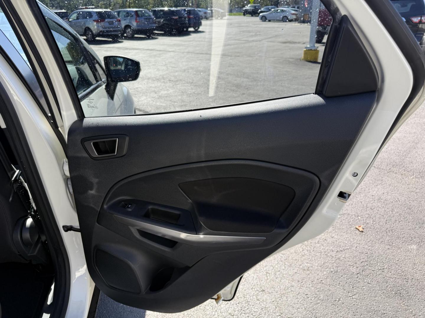 2020 White /Black Ford EcoSport SE AWD (MAJ6S3GL9LC) with an 2.0L I4 DOHC 16V engine, 6A transmission, located at 547 E. Main St., Orwell, OH, 44076, (440) 437-5893, 41.535435, -80.847855 - Discover comfort, technology, and versatility in this One Owner 2020 Ford EcoSport SE with All-Wheel Drive and a fuel-efficient 2.0L I4 Duratec engine. Enjoy smooth, responsive performance thanks to its 6-speed automatic transmission and achieve up to 29 MPG on the highway. Inside, you’ll find a w - Photo#43