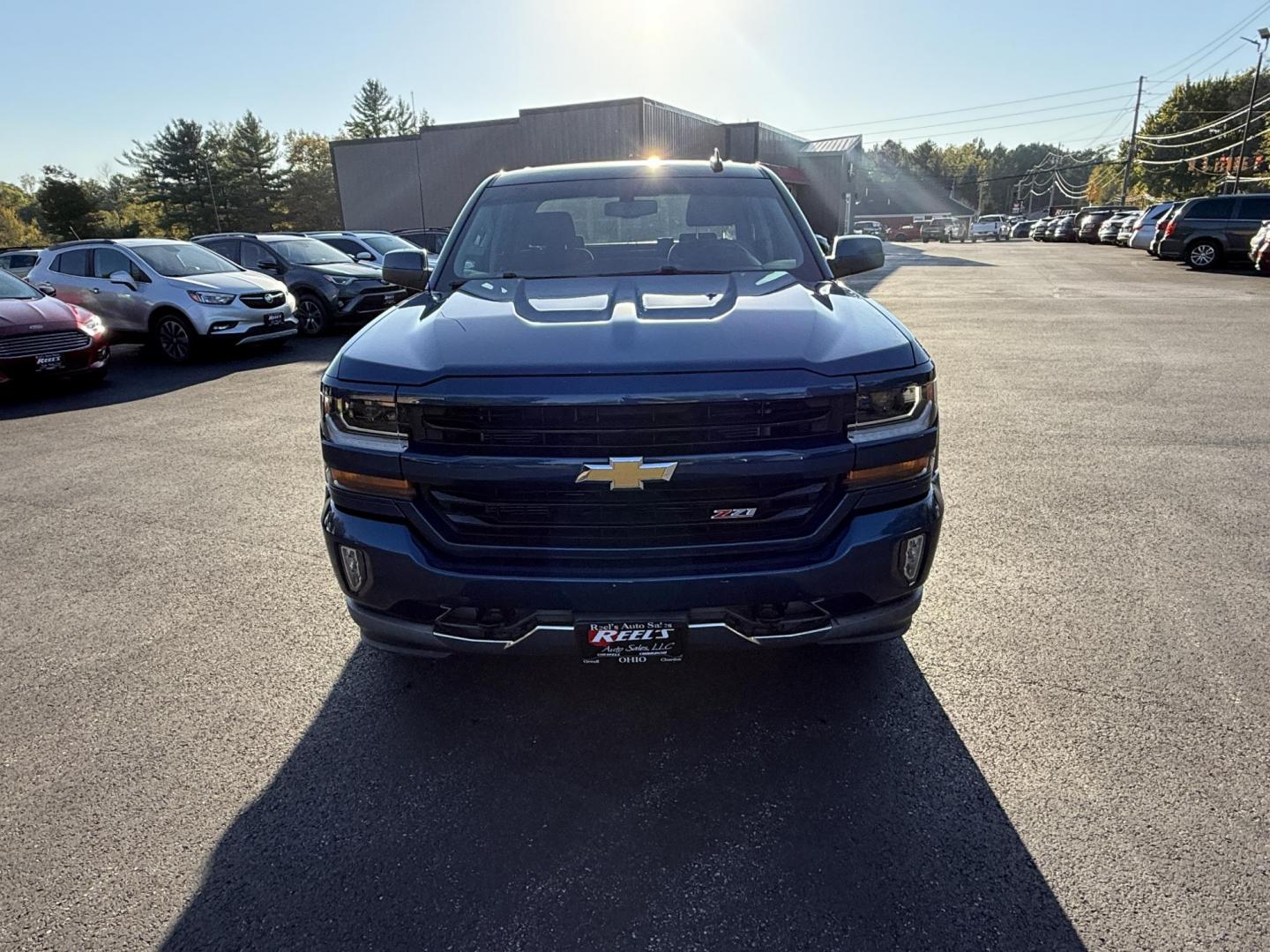 2018 Blue /Black Chevrolet Silverado 1500 LT Z71 Crew Cab Short Box 4WD (3GCUKRECXJG) with an 5.3L V8 OHV 16V engine, 6A transmission, located at 11115 Chardon Rd. , Chardon, OH, 44024, (440) 214-9705, 41.580246, -81.241943 - Rugged, reliable, and ready for work or play, this 2018 Chevrolet Silverado 1500 LT Z71 Crew Cab is the perfect blend of power, capability, and comfort. Under the hood, it boasts a proven 5.3-liter EcoTec3 V8 engine paired with a smooth 6-speed automatic transmission and 3.42 rear axle gearing, offe - Photo#1