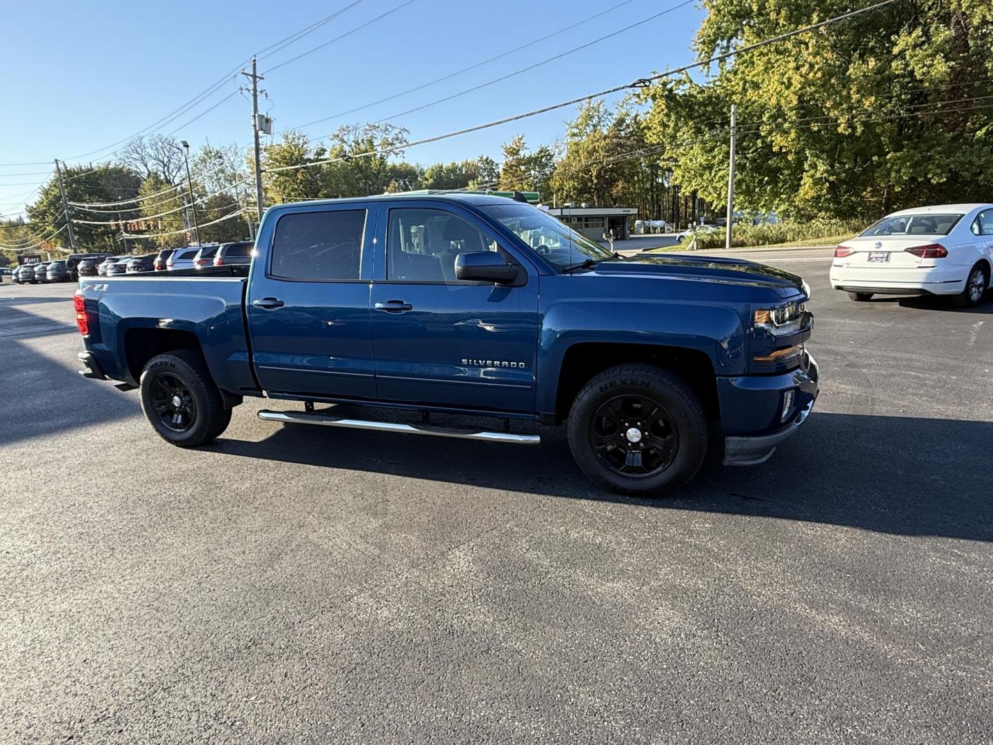2018 Blue /Black Chevrolet Silverado 1500 LT Z71 Crew Cab Short Box 4WD (3GCUKRECXJG) with an 5.3L V8 OHV 16V engine, 6A transmission, located at 11115 Chardon Rd. , Chardon, OH, 44024, (440) 214-9705, 41.580246, -81.241943 - Rugged, reliable, and ready for work or play, this 2018 Chevrolet Silverado 1500 LT Z71 Crew Cab is the perfect blend of power, capability, and comfort. Under the hood, it boasts a proven 5.3-liter EcoTec3 V8 engine paired with a smooth 6-speed automatic transmission and 3.42 rear axle gearing, offe - Photo#3