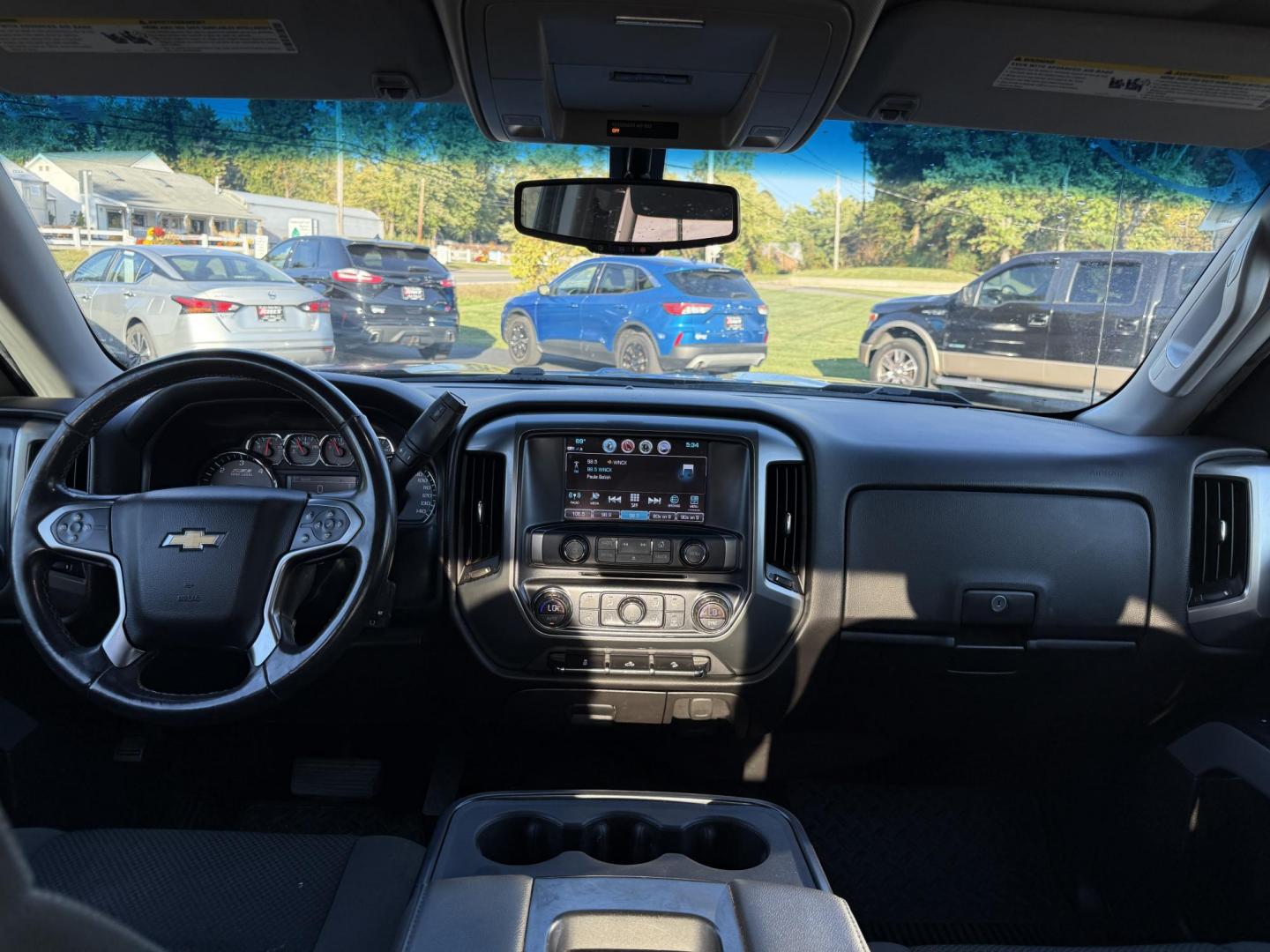 2018 Blue /Black Chevrolet Silverado 1500 LT Z71 Crew Cab Short Box 4WD (3GCUKRECXJG) with an 5.3L V8 OHV 16V engine, 6A transmission, located at 11115 Chardon Rd. , Chardon, OH, 44024, (440) 214-9705, 41.580246, -81.241943 - Rugged, reliable, and ready for work or play, this 2018 Chevrolet Silverado 1500 LT Z71 Crew Cab is the perfect blend of power, capability, and comfort. Under the hood, it boasts a proven 5.3-liter EcoTec3 V8 engine paired with a smooth 6-speed automatic transmission and 3.42 rear axle gearing, offe - Photo#34