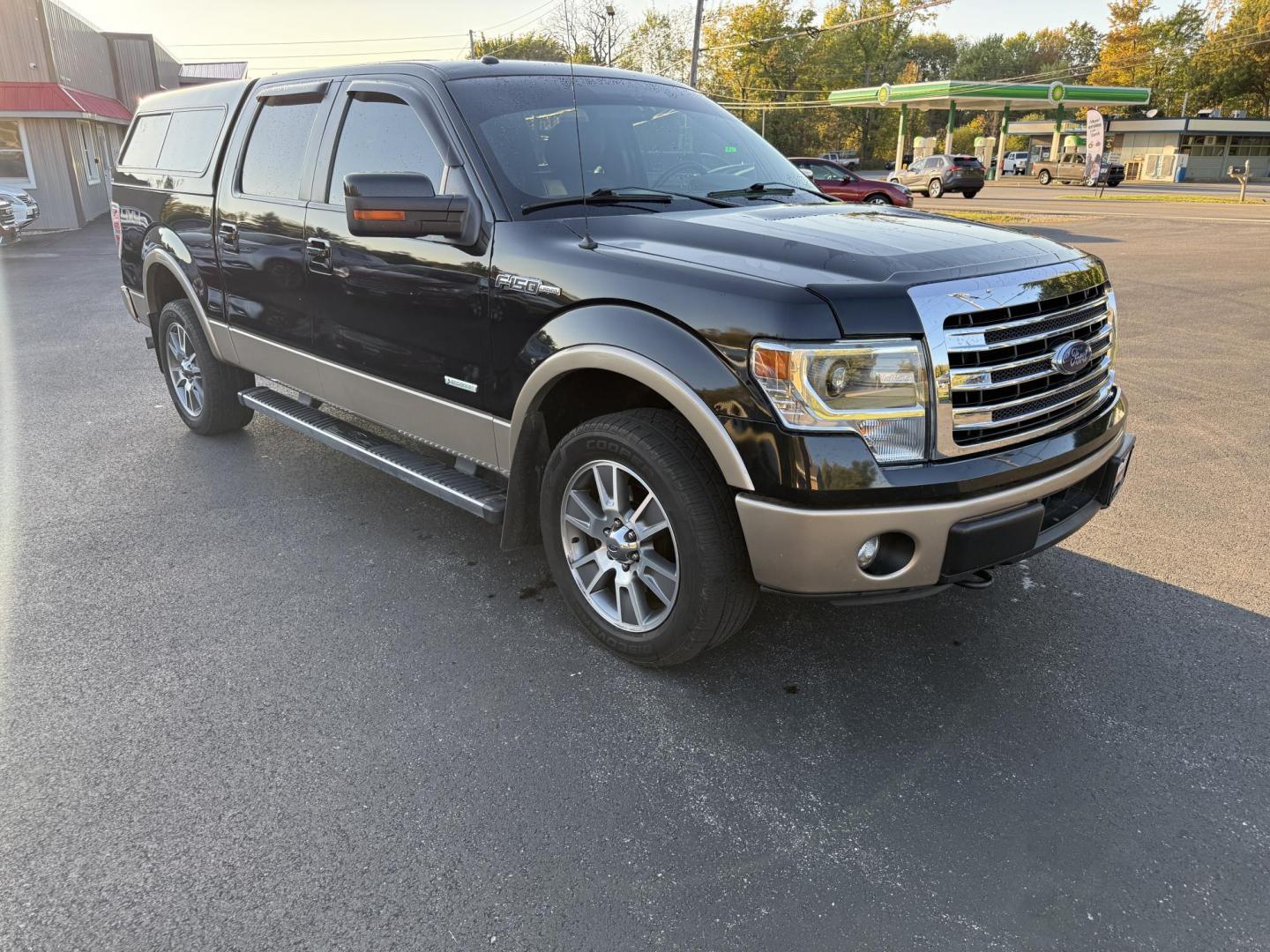 2014 Black /Black Ford F-150 Lariat SuperCrew 5.5-ft. Bed 4WD (1FTFW1ET7EK) with an 3.5L V6 Twin TURBO engine, 6-Speed Automatic transmission, located at 11115 Chardon Rd. , Chardon, OH, 44024, (440) 214-9705, 41.580246, -81.241943 - Experience impressive power and premium features with this 2014 Ford F-150 Lariat Crew Cab 4WD. Equipped with a 3.5L Twin Turbo EcoBoost V6 engine (365 hp/420 lb-ft) paired to a 6-speed automatic transmission and 3.55 rear axle, this F-150 offers a towing capacity of up to 9,700 pounds and versatile - Photo#2