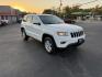2014 White /Black Jeep Grand Cherokee Laredo 4WD (1C4RJFAG1EC) with an 3.6L V6 DOHC 24V FFV engine, 8-Speed Automatic transmission, located at 11115 Chardon Rd. , Chardon, OH, 44024, (440) 214-9705, 41.580246, -81.241943 - This 2014 Jeep Grand Cherokee Laredo 4WD delivers a great mix of capability, efficiency, and comfort. Powered by the reliable 3.6L Pentastar V6 engine paired with an 8-speed automatic transmission, it offers smooth performance and up to 24 MPG on the highway. With 4WD and a 3,500-pound towing capaci - Photo#2