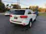 2014 White /Black Jeep Grand Cherokee Laredo 4WD (1C4RJFAG1EC) with an 3.6L V6 DOHC 24V FFV engine, 8-Speed Automatic transmission, located at 11115 Chardon Rd. , Chardon, OH, 44024, (440) 214-9705, 41.580246, -81.241943 - This 2014 Jeep Grand Cherokee Laredo 4WD delivers a great mix of capability, efficiency, and comfort. Powered by the reliable 3.6L Pentastar V6 engine paired with an 8-speed automatic transmission, it offers smooth performance and up to 24 MPG on the highway. With 4WD and a 3,500-pound towing capaci - Photo#7