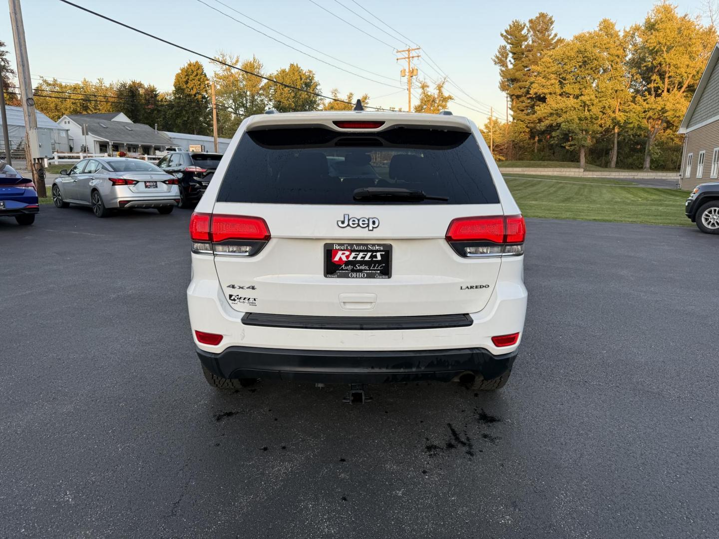 2014 White /Black Jeep Grand Cherokee Laredo 4WD (1C4RJFAG1EC) with an 3.6L V6 DOHC 24V FFV engine, 8-Speed Automatic transmission, located at 11115 Chardon Rd. , Chardon, OH, 44024, (440) 214-9705, 41.580246, -81.241943 - This 2014 Jeep Grand Cherokee Laredo 4WD delivers a great mix of capability, efficiency, and comfort. Powered by the reliable 3.6L Pentastar V6 engine paired with an 8-speed automatic transmission, it offers smooth performance and up to 24 MPG on the highway. With 4WD and a 3,500-pound towing capaci - Photo#8