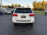 2014 White /Black Jeep Grand Cherokee Laredo 4WD (1C4RJFAG1EC) with an 3.6L V6 DOHC 24V FFV engine, 8-Speed Automatic transmission, located at 11115 Chardon Rd. , Chardon, OH, 44024, (440) 214-9705, 41.580246, -81.241943 - This 2014 Jeep Grand Cherokee Laredo 4WD delivers a great mix of capability, efficiency, and comfort. Powered by the reliable 3.6L Pentastar V6 engine paired with an 8-speed automatic transmission, it offers smooth performance and up to 24 MPG on the highway. With 4WD and a 3,500-pound towing capaci - Photo#8