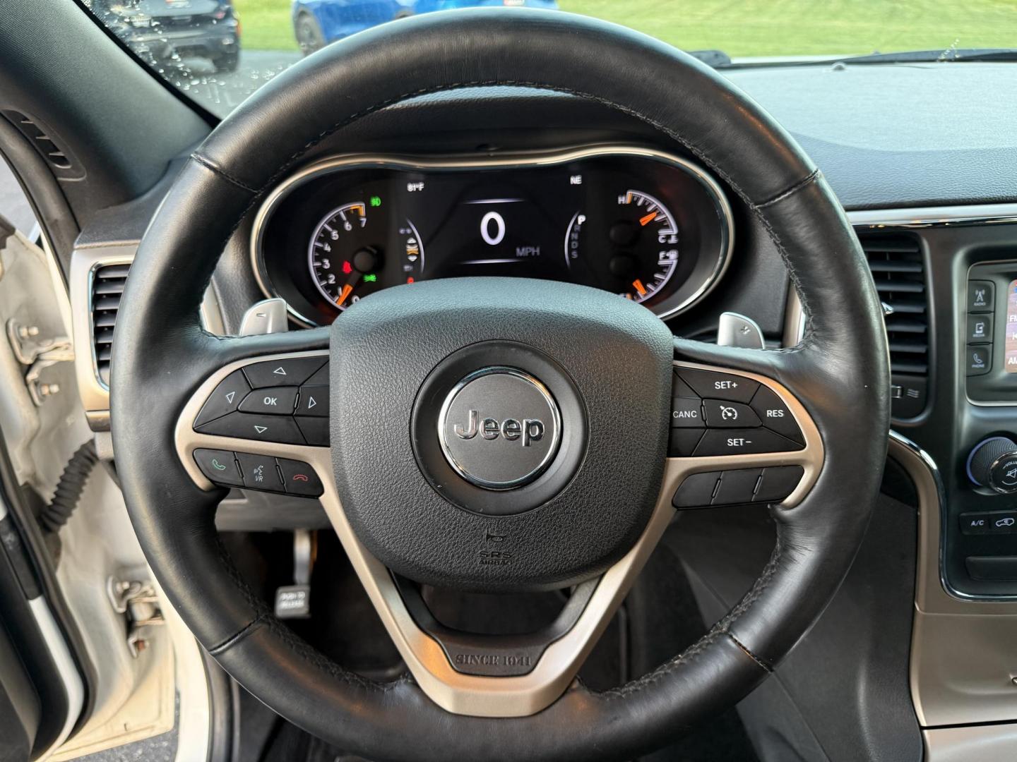 2014 White /Black Jeep Grand Cherokee Laredo 4WD (1C4RJFAG1EC) with an 3.6L V6 DOHC 24V FFV engine, 8-Speed Automatic transmission, located at 11115 Chardon Rd. , Chardon, OH, 44024, (440) 214-9705, 41.580246, -81.241943 - This 2014 Jeep Grand Cherokee Laredo 4WD delivers a great mix of capability, efficiency, and comfort. Powered by the reliable 3.6L Pentastar V6 engine paired with an 8-speed automatic transmission, it offers smooth performance and up to 24 MPG on the highway. With 4WD and a 3,500-pound towing capaci - Photo#23