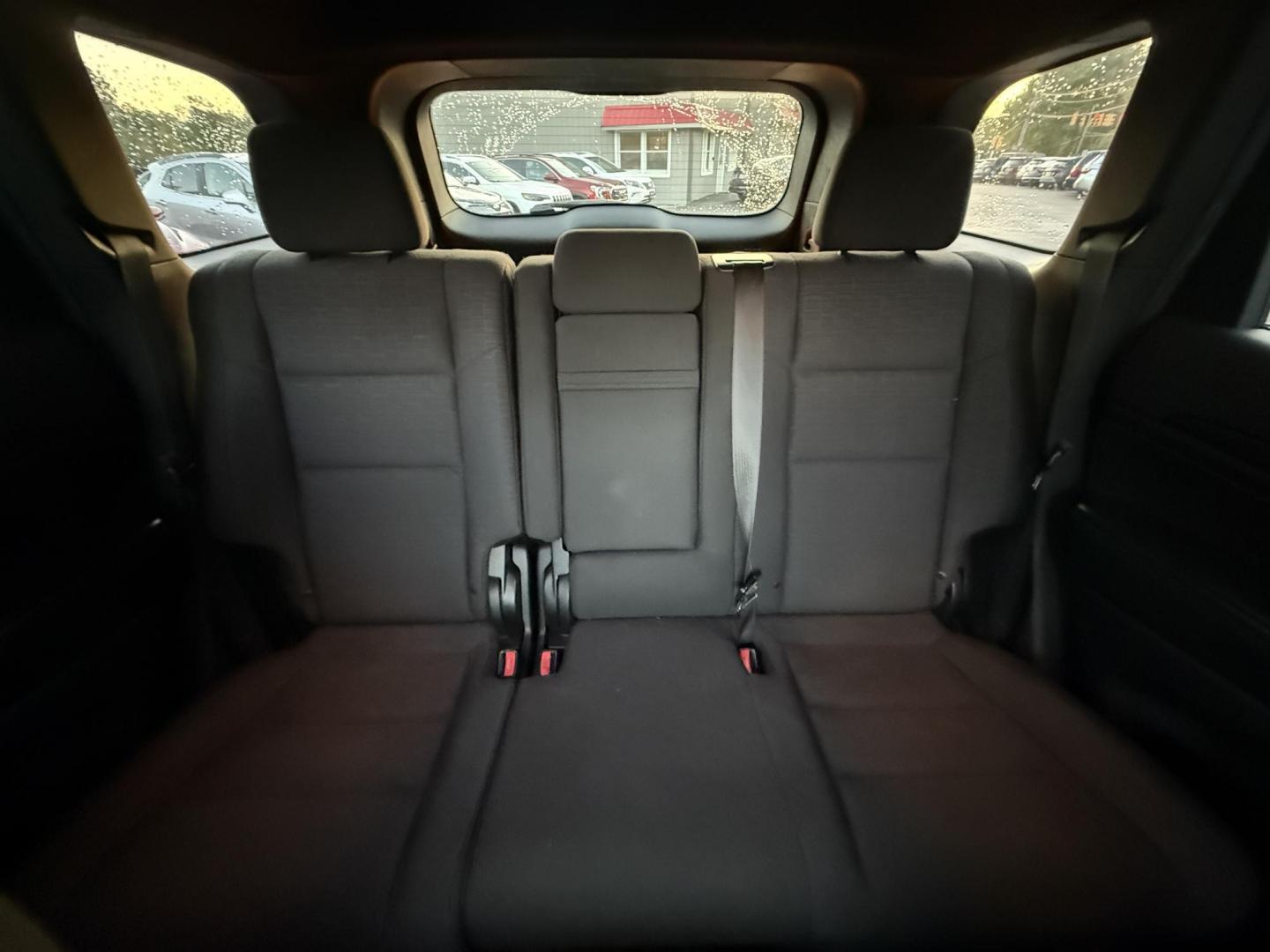 2014 White /Black Jeep Grand Cherokee Laredo 4WD (1C4RJFAG1EC) with an 3.6L V6 DOHC 24V FFV engine, 8-Speed Automatic transmission, located at 11115 Chardon Rd. , Chardon, OH, 44024, (440) 214-9705, 41.580246, -81.241943 - This 2014 Jeep Grand Cherokee Laredo 4WD delivers a great mix of capability, efficiency, and comfort. Powered by the reliable 3.6L Pentastar V6 engine paired with an 8-speed automatic transmission, it offers smooth performance and up to 24 MPG on the highway. With 4WD and a 3,500-pound towing capaci - Photo#29