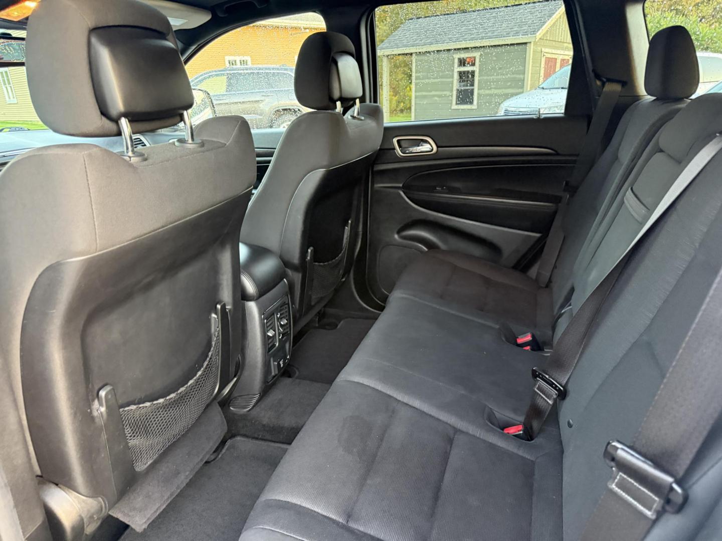 2014 White /Black Jeep Grand Cherokee Laredo 4WD (1C4RJFAG1EC) with an 3.6L V6 DOHC 24V FFV engine, 8-Speed Automatic transmission, located at 11115 Chardon Rd. , Chardon, OH, 44024, (440) 214-9705, 41.580246, -81.241943 - This 2014 Jeep Grand Cherokee Laredo 4WD delivers a great mix of capability, efficiency, and comfort. Powered by the reliable 3.6L Pentastar V6 engine paired with an 8-speed automatic transmission, it offers smooth performance and up to 24 MPG on the highway. With 4WD and a 3,500-pound towing capaci - Photo#30