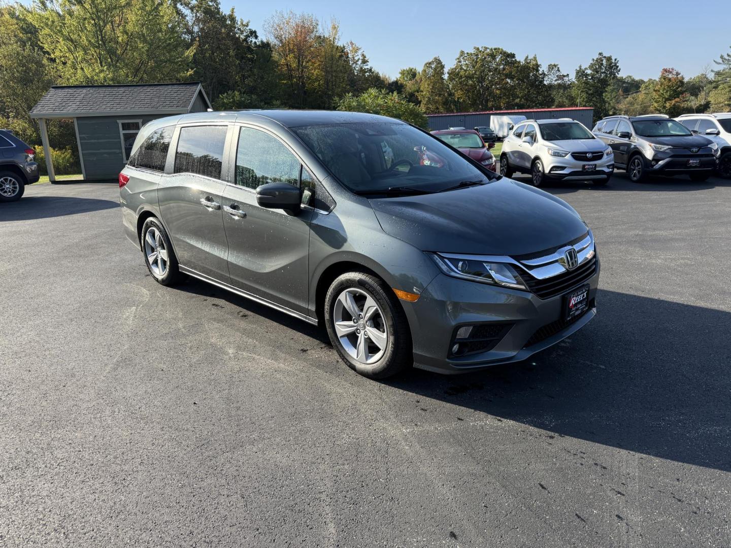 2019 Gray /Tan Honda Odyssey EX (5FNRL6H54KB) with an 3.5L V6 SOHC 24V engine, 9A transmission, located at 11115 Chardon Rd. , Chardon, OH, 44024, (440) 214-9705, 41.580246, -81.241943 - This 2019 Honda Odyssey EX is the ultimate family minivan, combining smart technology, advanced safety, and everyday comfort. Powered by a 3.5L Earth Dreams V6 engine and smooth 9-speed automatic transmission, it delivers up to 28 MPG on the highway for efficient road trips or daily drives. Inside, - Photo#2