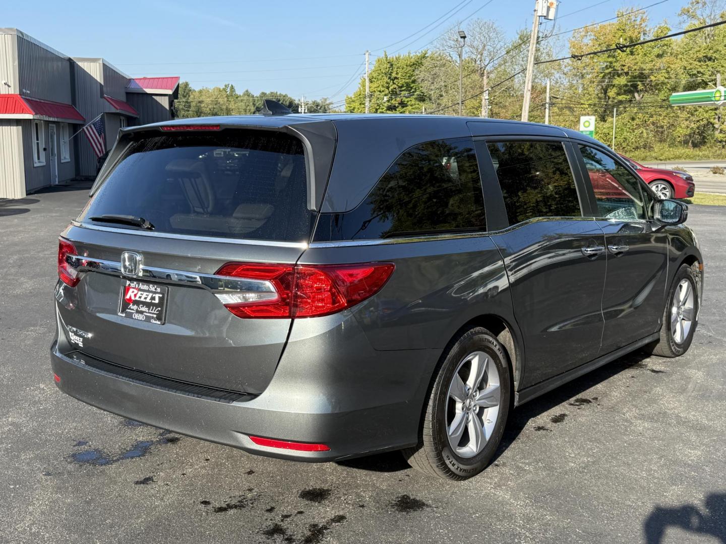 2019 Gray /Tan Honda Odyssey EX (5FNRL6H54KB) with an 3.5L V6 SOHC 24V engine, 9A transmission, located at 11115 Chardon Rd. , Chardon, OH, 44024, (440) 214-9705, 41.580246, -81.241943 - This 2019 Honda Odyssey EX is the ultimate family minivan, combining smart technology, advanced safety, and everyday comfort. Powered by a 3.5L Earth Dreams V6 engine and smooth 9-speed automatic transmission, it delivers up to 28 MPG on the highway for efficient road trips or daily drives. Inside, - Photo#8