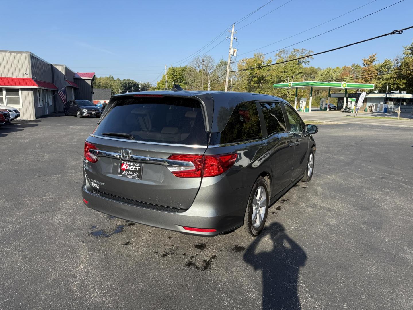 2019 Gray /Tan Honda Odyssey EX (5FNRL6H54KB) with an 3.5L V6 SOHC 24V engine, 9A transmission, located at 11115 Chardon Rd. , Chardon, OH, 44024, (440) 214-9705, 41.580246, -81.241943 - This 2019 Honda Odyssey EX is the ultimate family minivan, combining smart technology, advanced safety, and everyday comfort. Powered by a 3.5L Earth Dreams V6 engine and smooth 9-speed automatic transmission, it delivers up to 28 MPG on the highway for efficient road trips or daily drives. Inside, - Photo#7