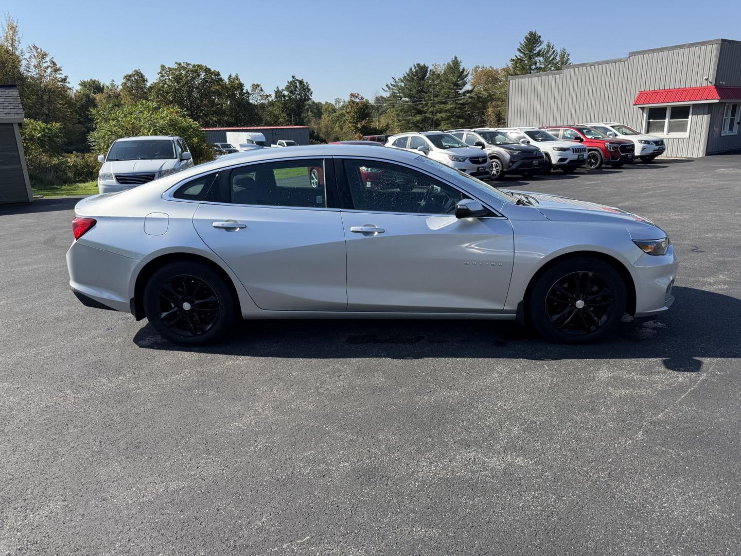 2016 Silver /Black Chevrolet Malibu 1LT (1G1ZE5ST0GF) with an 1.5L I4 DOHC 16V TURBO engine, 6A transmission, located at 11115 Chardon Rd. , Chardon, OH, 44024, (440) 214-9705, 41.580246, -81.241943 - 2016 Chevrolet Malibu LT – Efficient, Modern, and Well-Equipped ---- This 2016 Chevrolet Malibu LT is a stylish and efficient midsize sedan, powered by a 1.5L turbocharged EcoTec I4 engine paired with a 6-speed automatic transmission. Enjoy impressive fuel economy with up to 36 MPG on the highway, - Photo#5