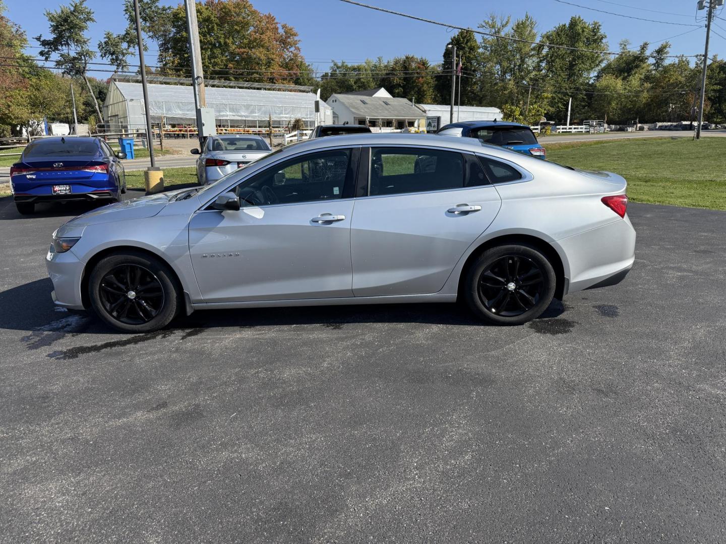 2016 Silver /Black Chevrolet Malibu 1LT (1G1ZE5ST0GF) with an 1.5L I4 DOHC 16V TURBO engine, 6A transmission, located at 11115 Chardon Rd. , Chardon, OH, 44024, (440) 214-9705, 41.580246, -81.241943 - 2016 Chevrolet Malibu LT – Efficient, Modern, and Well-Equipped ---- This 2016 Chevrolet Malibu LT is a stylish and efficient midsize sedan, powered by a 1.5L turbocharged EcoTec I4 engine paired with a 6-speed automatic transmission. Enjoy impressive fuel economy with up to 36 MPG on the highway, - Photo#12
