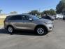 2017 Gray /Black Kia Sorento LX AWD (5XYPGDA32HG) with an 2.4L I4 DOHC 16V engine, 6A transmission, located at 547 E. Main St., Orwell, OH, 44076, (440) 437-5893, 41.535435, -80.847855 - Experience comfort, capability, and advanced technology with this 2017 Kia Sorento LX All-Wheel Drive! Powered by a fuel-efficient 2.4L GDI engine paired with a smooth 6-speed automatic transmission, the Sorento delivers confident performance and up to 25 MPG on the highway. The locking center diffe - Photo#3