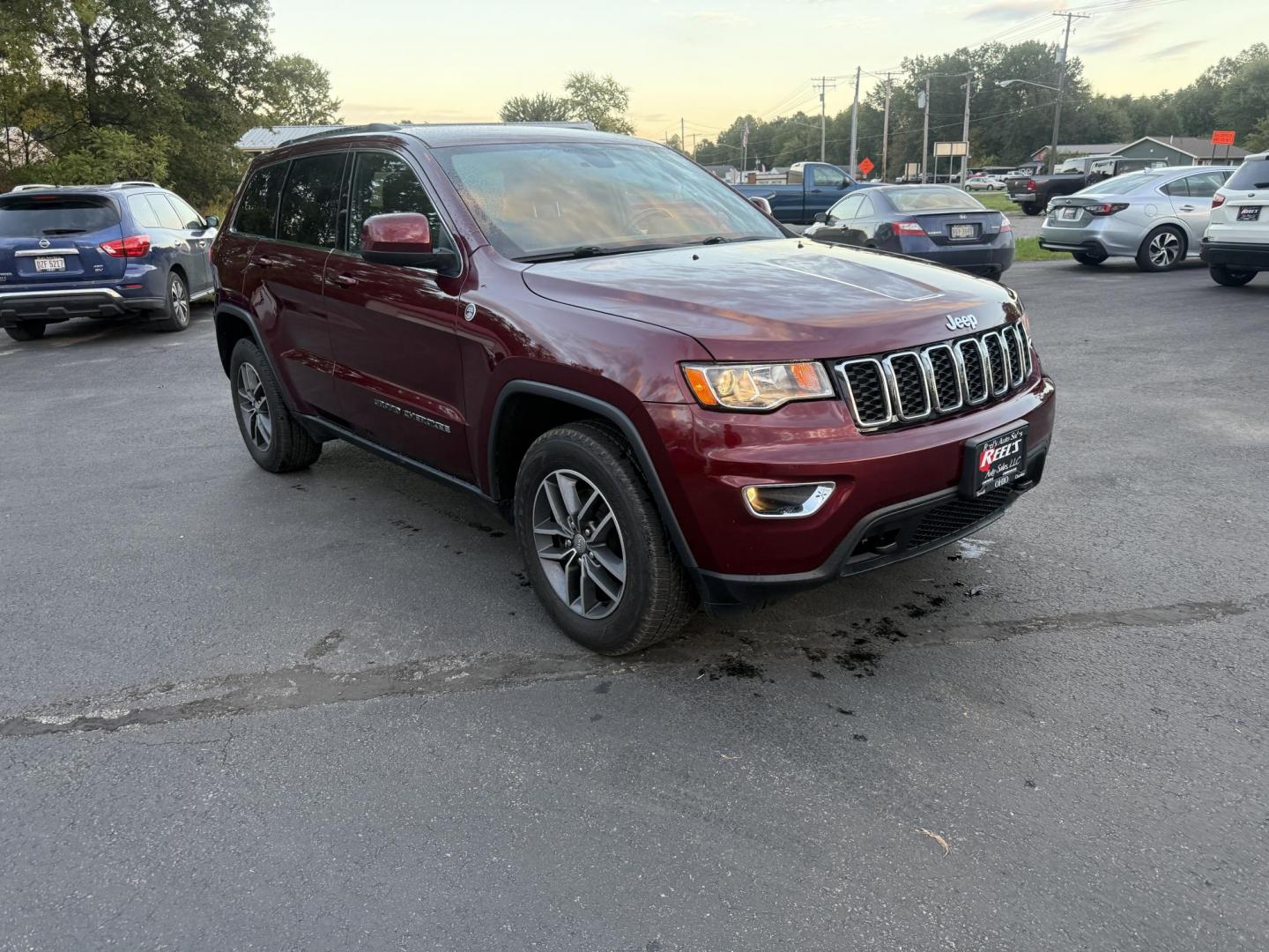 2018 Red /Black Jeep Grand Cherokee Laredo E 4WD (1C4RJFAG9JC) with an 3.6L V6 DOHC 24V engine, 8A transmission, located at 547 E. Main St., Orwell, OH, 44076, (440) 437-5893, 41.535435, -80.847855 - 2018 Jeep Grand Cherokee Laredo E – Trail Ready, Tech Loaded, and Built to Impress! Experience legendary Jeep capability and premium comfort with this 2018 Grand Cherokee Laredo E. Featuring the powerful and reliable 3.6L Pentastar V6 paired with an 8-speed automatic transmission, this SUV deliv - Photo#2