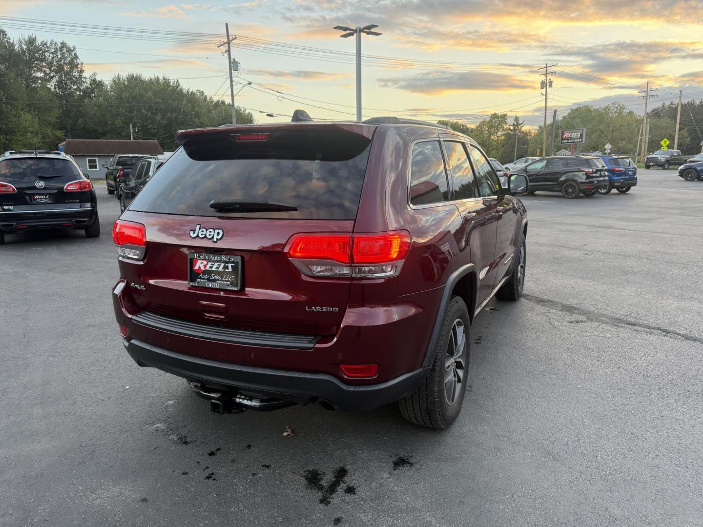 2018 Red /Black Jeep Grand Cherokee Laredo E 4WD (1C4RJFAG9JC) with an 3.6L V6 DOHC 24V engine, 8A transmission, located at 547 E. Main St., Orwell, OH, 44076, (440) 437-5893, 41.535435, -80.847855 - 2018 Jeep Grand Cherokee Laredo E – Trail Ready, Tech Loaded, and Built to Impress! Experience legendary Jeep capability and premium comfort with this 2018 Grand Cherokee Laredo E. Featuring the powerful and reliable 3.6L Pentastar V6 paired with an 8-speed automatic transmission, this SUV deliv - Photo#8
