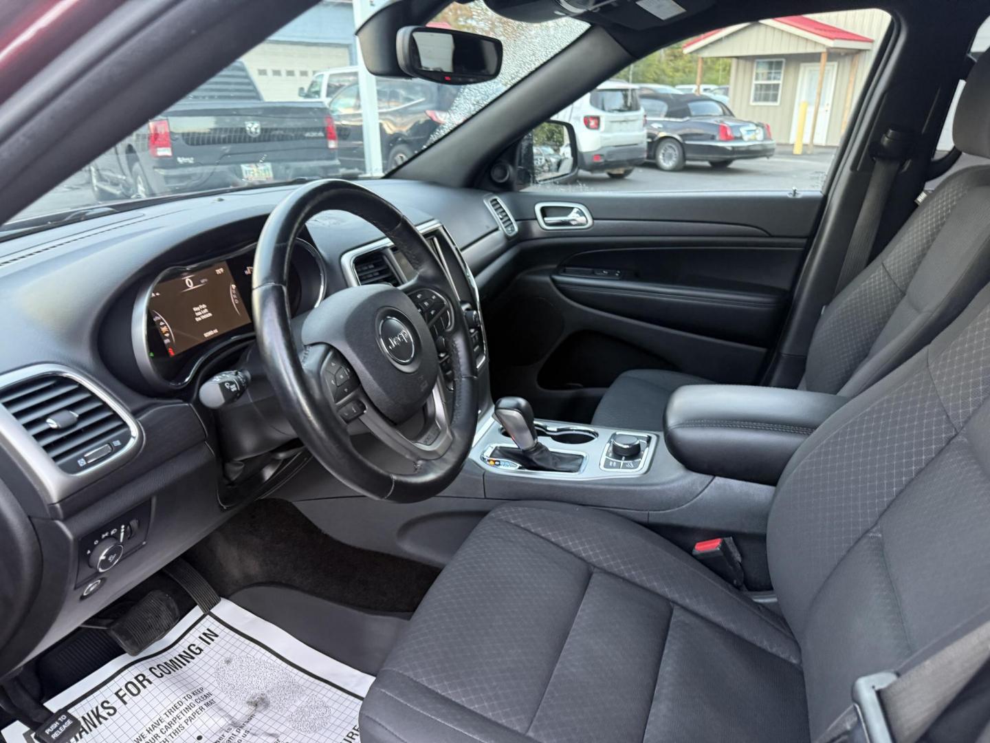 2018 Red /Black Jeep Grand Cherokee Laredo E 4WD (1C4RJFAG9JC) with an 3.6L V6 DOHC 24V engine, 8A transmission, located at 547 E. Main St., Orwell, OH, 44076, (440) 437-5893, 41.535435, -80.847855 - 2018 Jeep Grand Cherokee Laredo E – Trail Ready, Tech Loaded, and Built to Impress! Experience legendary Jeep capability and premium comfort with this 2018 Grand Cherokee Laredo E. Featuring the powerful and reliable 3.6L Pentastar V6 paired with an 8-speed automatic transmission, this SUV deliv - Photo#17