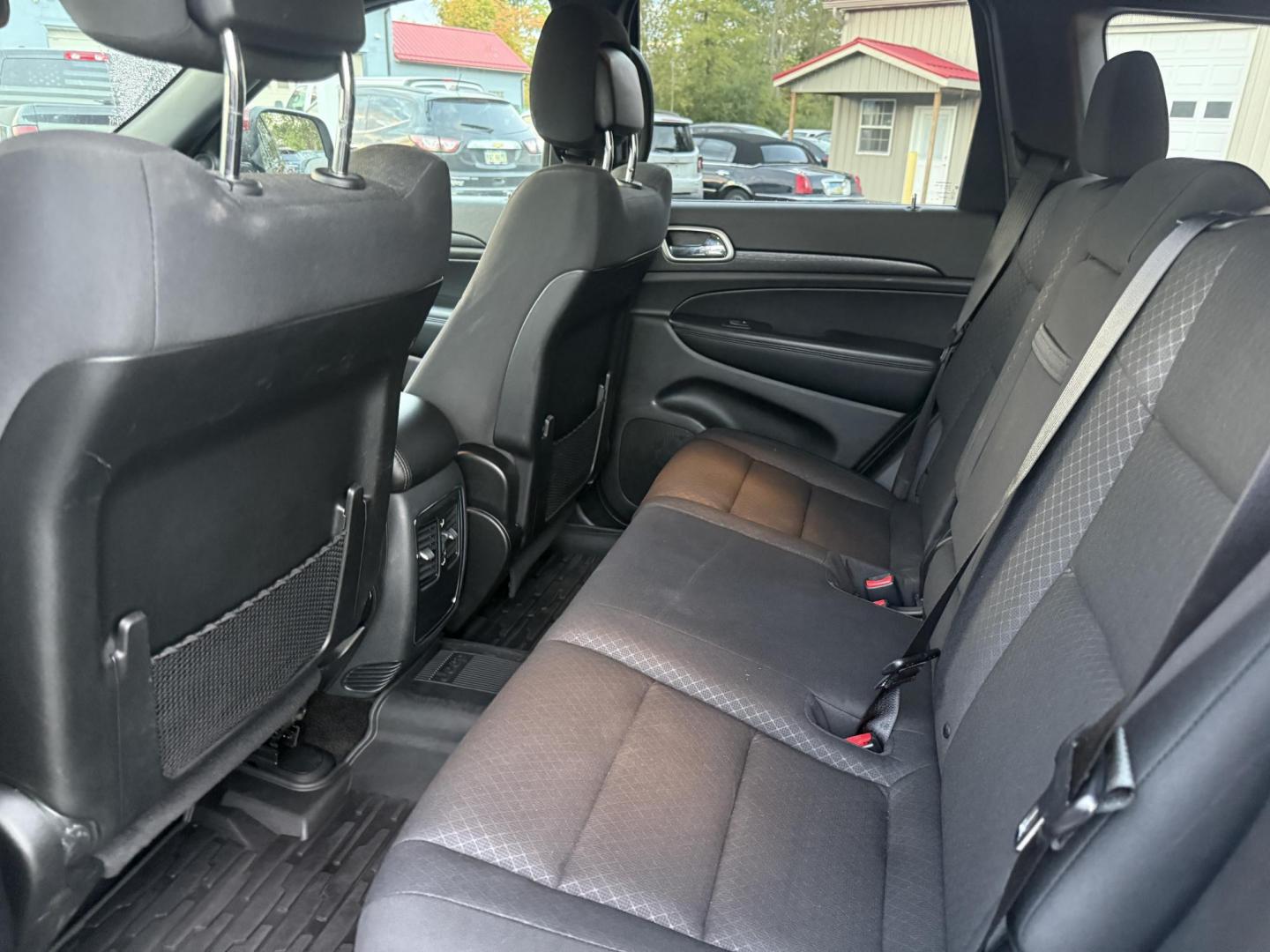 2018 Red /Black Jeep Grand Cherokee Laredo E 4WD (1C4RJFAG9JC) with an 3.6L V6 DOHC 24V engine, 8A transmission, located at 547 E. Main St., Orwell, OH, 44076, (440) 437-5893, 41.535435, -80.847855 - 2018 Jeep Grand Cherokee Laredo E – Trail Ready, Tech Loaded, and Built to Impress! Experience legendary Jeep capability and premium comfort with this 2018 Grand Cherokee Laredo E. Featuring the powerful and reliable 3.6L Pentastar V6 paired with an 8-speed automatic transmission, this SUV deliv - Photo#35