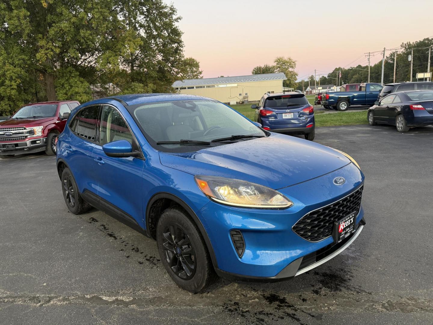 2020 Blue /Gray Ford Escape SE AWD (1FMCU9G62LU) with an 1.5L I3 DOHC 16V TURBO engine, 8-Speed Automatic transmission, located at 547 E. Main St., Orwell, OH, 44076, (440) 437-5893, 41.535435, -80.847855 - 2020 Ford Escape SE 4WD – Modern Style, Smart Technology, Unmatched Versatility Elevate your drive with this 2020 Ford Escape SE 4WD, a perfect blend of style, comfort, and cutting-edge technology. Enjoy the efficiency and power of its turbocharged engine and 8-speed automatic transmission, deliv - Photo#2