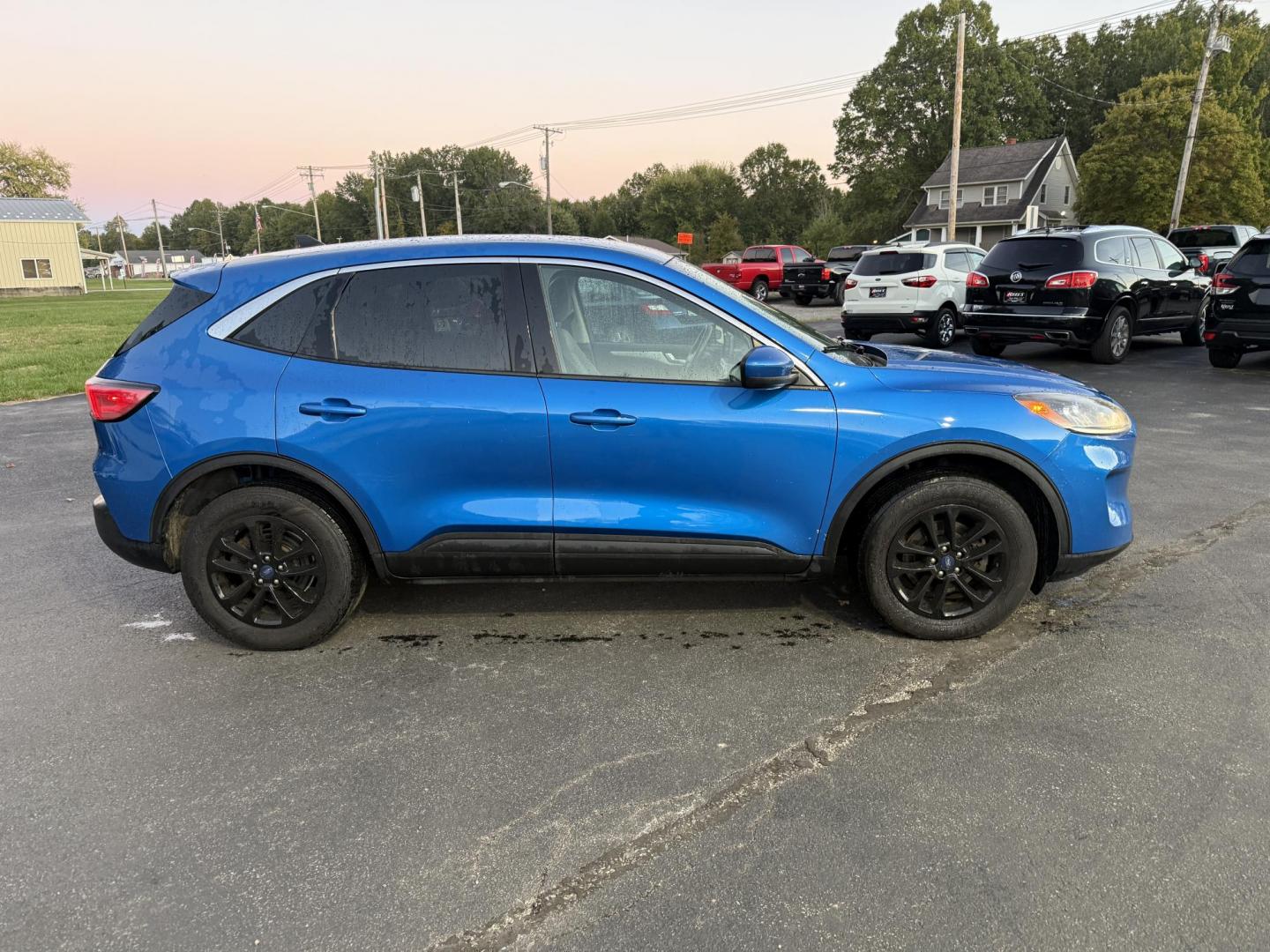2020 Blue /Gray Ford Escape SE AWD (1FMCU9G62LU) with an 1.5L I3 DOHC 16V TURBO engine, 8-Speed Automatic transmission, located at 547 E. Main St., Orwell, OH, 44076, (440) 437-5893, 41.535435, -80.847855 - 2020 Ford Escape SE 4WD – Modern Style, Smart Technology, Unmatched Versatility Elevate your drive with this 2020 Ford Escape SE 4WD, a perfect blend of style, comfort, and cutting-edge technology. Enjoy the efficiency and power of its turbocharged engine and 8-speed automatic transmission, deliv - Photo#5
