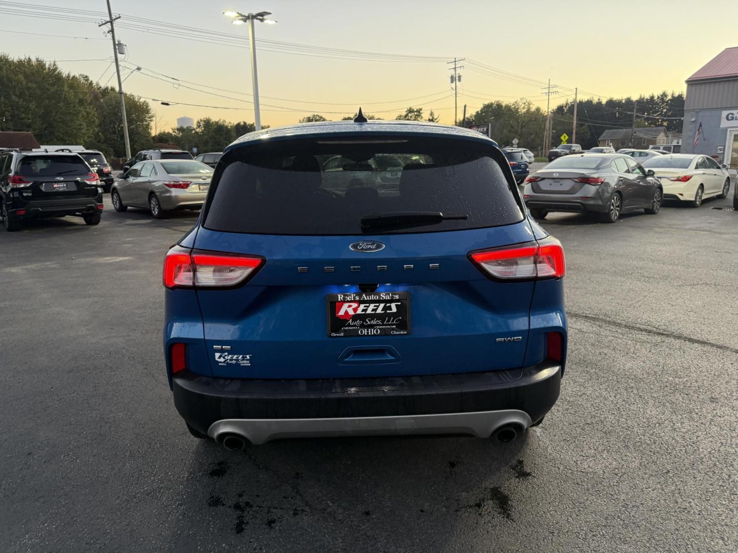 2020 Blue /Gray Ford Escape SE AWD (1FMCU9G62LU) with an 1.5L I3 DOHC 16V TURBO engine, 8-Speed Automatic transmission, located at 547 E. Main St., Orwell, OH, 44076, (440) 437-5893, 41.535435, -80.847855 - 2020 Ford Escape SE 4WD – Modern Style, Smart Technology, Unmatched Versatility Elevate your drive with this 2020 Ford Escape SE 4WD, a perfect blend of style, comfort, and cutting-edge technology. Enjoy the efficiency and power of its turbocharged engine and 8-speed automatic transmission, deliv - Photo#8