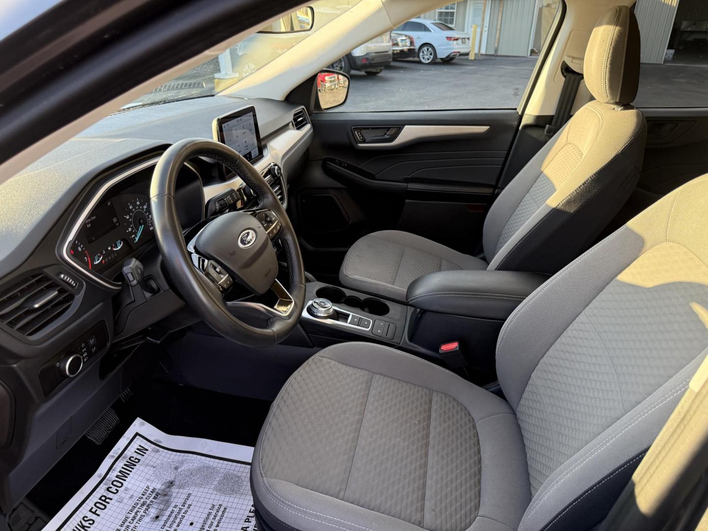 2022 Gray /Gray Ford Escape SE AWD (1FMCU9G6XNU) with an 1.5L I3 DOHC 16V TURBO engine, 8-Speed Automatic transmission, located at 547 E. Main St., Orwell, OH, 44076, (440) 437-5893, 41.535435, -80.847855 - Experience modern versatility and comfort with this 2022 Ford Escape SE 4WD. Powered by an efficient turbocharged EcoBoost engine and 8-speed automatic transmission, this SUV offers impressive fuel economy—up to 31 MPG on the highway. The well-equipped interior features heated front seats, a heate - Photo#15