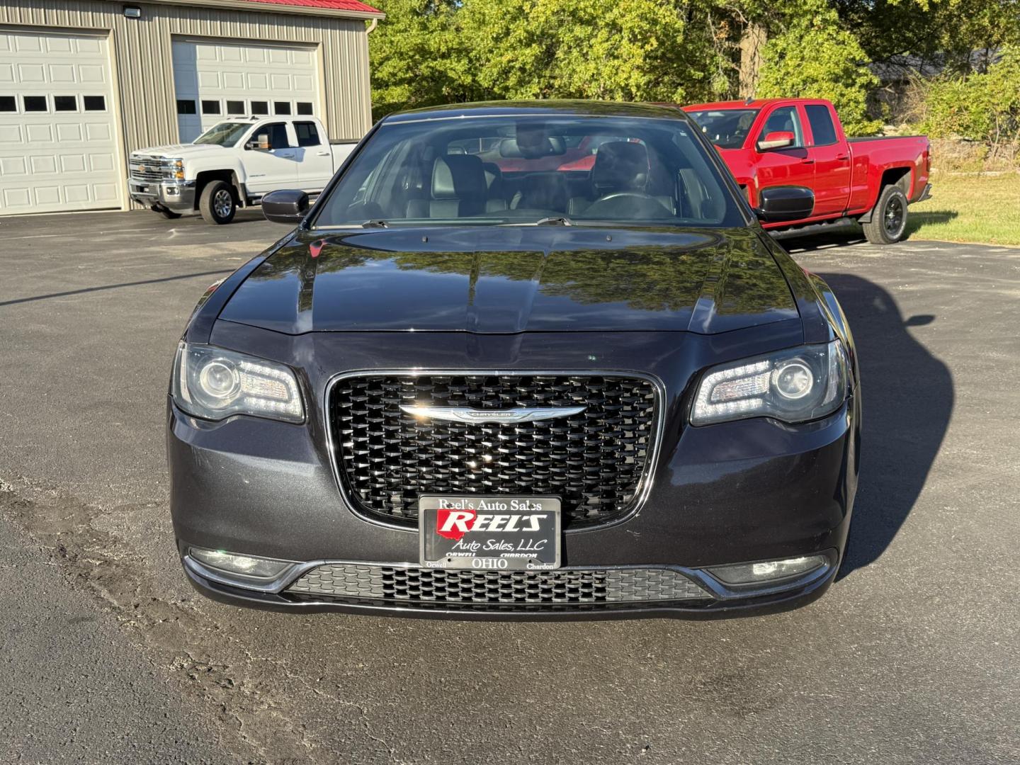 2016 Gray /Black Chrysler 300 S V6 AWD (2C3CCAGG1GH) with an 3.6L V6 DOHC 24V engine, 8A transmission, located at 547 E. Main St., Orwell, OH, 44076, (440) 437-5893, 41.535435, -80.847855 - Drive in style and confidence with this 2016 Chrysler 300 S AWD. Powered by a robust 3.6L V6 Pentastar engine delivering 300 horsepower and paired with a smooth 8-speed automatic transmission, this sedan offers both exhilarating performance and up to 27 MPG on the highway. The sophisticated leather - Photo#1
