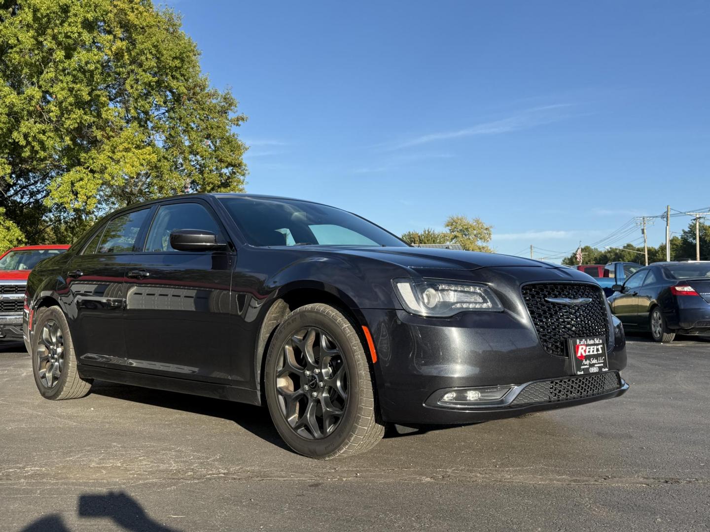 2016 Gray /Black Chrysler 300 S V6 AWD (2C3CCAGG1GH) with an 3.6L V6 DOHC 24V engine, 8A transmission, located at 547 E. Main St., Orwell, OH, 44076, (440) 437-5893, 41.535435, -80.847855 - Drive in style and confidence with this 2016 Chrysler 300 S AWD. Powered by a robust 3.6L V6 Pentastar engine delivering 300 horsepower and paired with a smooth 8-speed automatic transmission, this sedan offers both exhilarating performance and up to 27 MPG on the highway. The sophisticated leather - Photo#2
