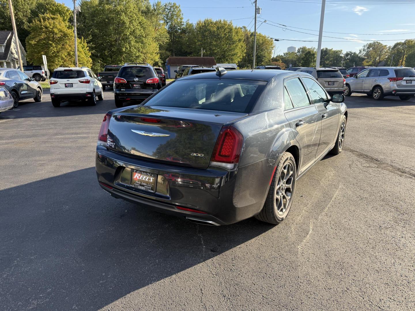 2016 Gray /Black Chrysler 300 S V6 AWD (2C3CCAGG1GH) with an 3.6L V6 DOHC 24V engine, 8A transmission, located at 547 E. Main St., Orwell, OH, 44076, (440) 437-5893, 41.535435, -80.847855 - Drive in style and confidence with this 2016 Chrysler 300 S AWD. Powered by a robust 3.6L V6 Pentastar engine delivering 300 horsepower and paired with a smooth 8-speed automatic transmission, this sedan offers both exhilarating performance and up to 27 MPG on the highway. The sophisticated leather - Photo#7