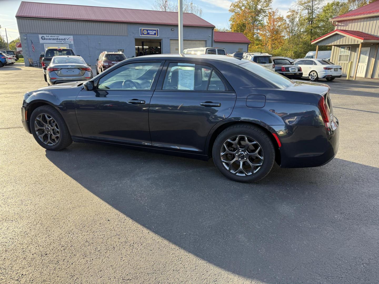 2016 Gray /Black Chrysler 300 S V6 AWD (2C3CCAGG1GH) with an 3.6L V6 DOHC 24V engine, 8A transmission, located at 547 E. Main St., Orwell, OH, 44076, (440) 437-5893, 41.535435, -80.847855 - Drive in style and confidence with this 2016 Chrysler 300 S AWD. Powered by a robust 3.6L V6 Pentastar engine delivering 300 horsepower and paired with a smooth 8-speed automatic transmission, this sedan offers both exhilarating performance and up to 27 MPG on the highway. The sophisticated leather - Photo#10