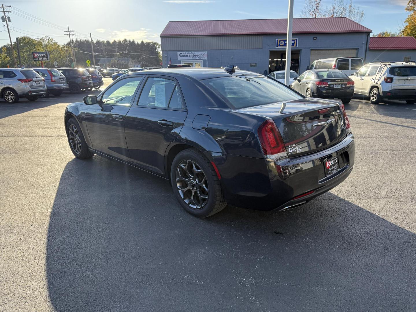 2016 Gray /Black Chrysler 300 S V6 AWD (2C3CCAGG1GH) with an 3.6L V6 DOHC 24V engine, 8A transmission, located at 547 E. Main St., Orwell, OH, 44076, (440) 437-5893, 41.535435, -80.847855 - Drive in style and confidence with this 2016 Chrysler 300 S AWD. Powered by a robust 3.6L V6 Pentastar engine delivering 300 horsepower and paired with a smooth 8-speed automatic transmission, this sedan offers both exhilarating performance and up to 27 MPG on the highway. The sophisticated leather - Photo#9