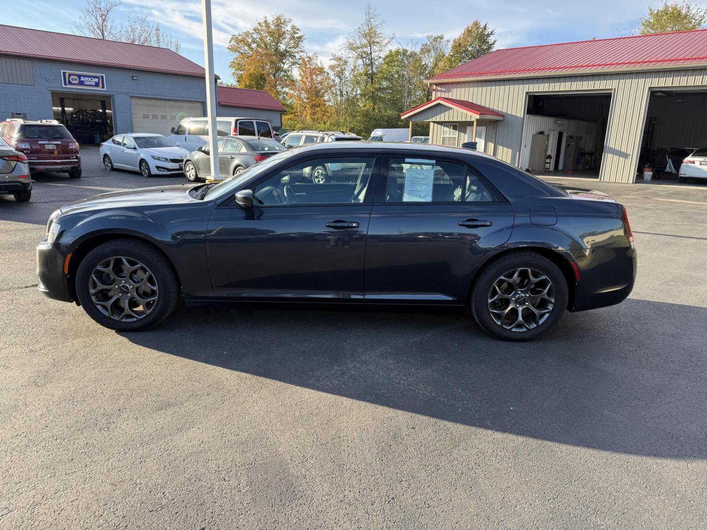 2016 Gray /Black Chrysler 300 S V6 AWD (2C3CCAGG1GH) with an 3.6L V6 DOHC 24V engine, 8A transmission, located at 547 E. Main St., Orwell, OH, 44076, (440) 437-5893, 41.535435, -80.847855 - Drive in style and confidence with this 2016 Chrysler 300 S AWD. Powered by a robust 3.6L V6 Pentastar engine delivering 300 horsepower and paired with a smooth 8-speed automatic transmission, this sedan offers both exhilarating performance and up to 27 MPG on the highway. The sophisticated leather - Photo#12