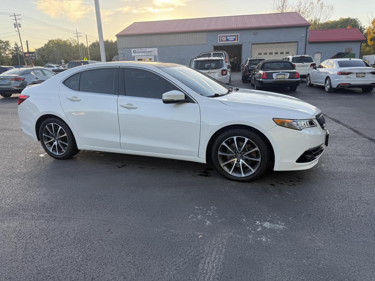 2016 White /Black Acura TLX 9-Spd AT SH-AWD w/Advance Package (19UUB3F78GA) with an 3.5L V6 SOHC 24V engine, 9A transmission, located at 547 E. Main St., Orwell, OH, 44076, (440) 437-5893, 41.535435, -80.847855 - Experience luxury and performance with this 2016 Acura TLX SH-AWD with Advance Package. Powered by a responsive 3.5L V6 engine and smooth 9-speed automatic transmission, this sedan delivers impressive acceleration—0 to 60 in just 5.7 seconds—while achieving up to 31 MPG on the highway. Enjoy a r - Photo#3