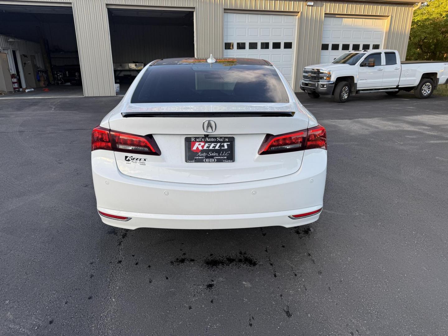 2016 White /Black Acura TLX 9-Spd AT SH-AWD w/Advance Package (19UUB3F78GA) with an 3.5L V6 SOHC 24V engine, 9A transmission, located at 547 E. Main St., Orwell, OH, 44076, (440) 437-5893, 41.535435, -80.847855 - Experience luxury and performance with this 2016 Acura TLX SH-AWD with Advance Package. Powered by a responsive 3.5L V6 engine and smooth 9-speed automatic transmission, this sedan delivers impressive acceleration—0 to 60 in just 5.7 seconds—while achieving up to 31 MPG on the highway. Enjoy a r - Photo#8